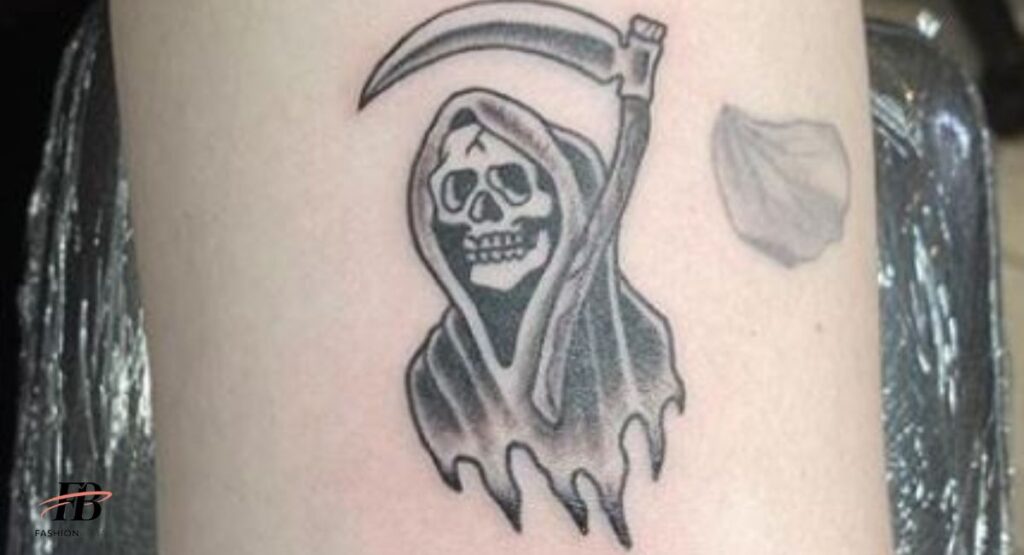 5. A TATTOO OF A SMALL GRIM REAPER